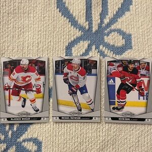 Defesemen McKenzie Weeger Michael Matheson and Kevil Bahl Hockey Cards Set